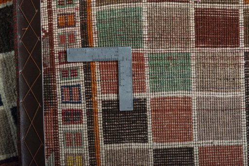 Close-up detail of 2000s Persian Gabbeh rug from Iran / Persia showing Wool weave