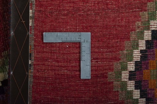 Close-up detail of 2000s Persian Gabbeh rug from Iran / Persia showing Wool weave