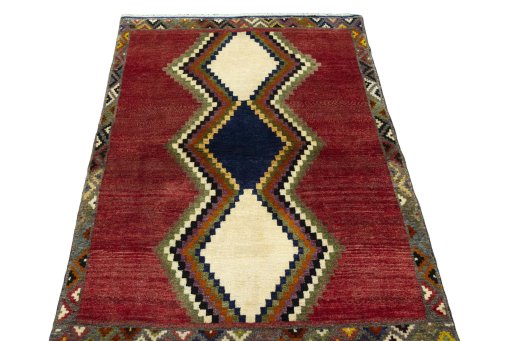 Surface texture of 2000s Persian Gabbeh rug with natural Wool and intricate pattern