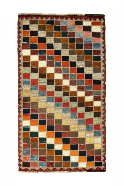 Full view of 2000s Persian Gabbeh rug from Iran / Persia, 141 × 80 cm in Multi Color tones