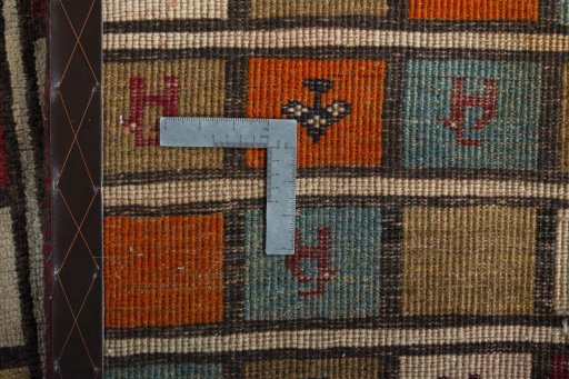 Close-up detail of 2000s Persian Gabbeh rug from Iran / Persia showing Wool weave