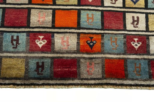 Central medallion detail of 2000s Persian Gabbeh rug from Iran / Persia