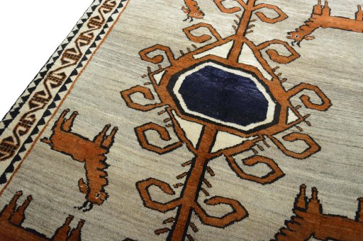 Backside of handmade 2000s Persian Gabbeh rug showing knot structure and weave density