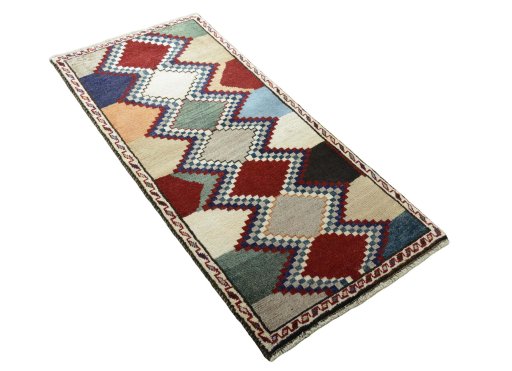 Close-up detail of 2000s Persian Gabbeh rug from Iran / Persia showing Wool weave