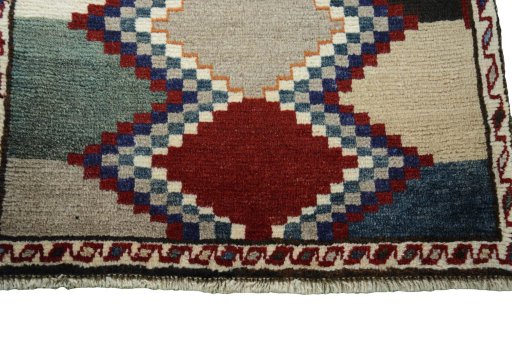 Central medallion detail of 2000s Persian Gabbeh rug from Iran / Persia
