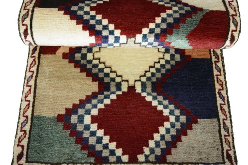 Full view of 2000s Persian Gabbeh rug from Iran / Persia, 144 × 66 cm in Multi Color tones
