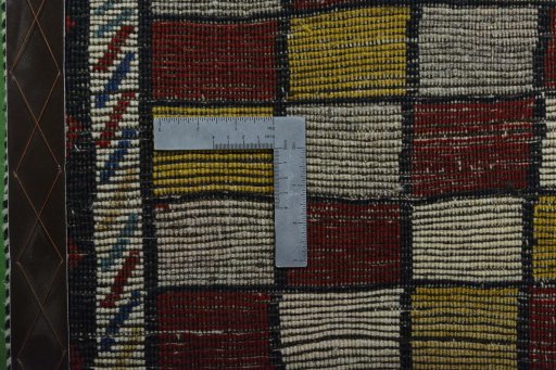 Close-up detail of 2000s Persian Gabbeh rug from Iran / Persia showing Wool weave