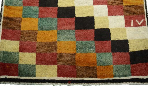 Central medallion detail of 2000s Persian Gabbeh rug from Iran / Persia