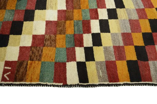 Close-up detail of 2000s Persian Gabbeh rug from Iran / Persia showing Wool weave