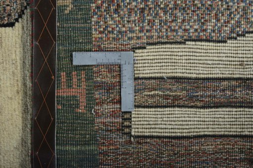 Close-up detail of 2000s Persian Gabbeh rug from Iran / Persia showing Wool weave