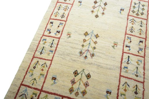 Backside of handmade New Persian Gabbeh rug showing knot structure and weave density