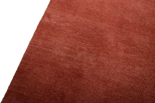 Backside of handmade New Persian Gabbeh rug showing knot structure and weave density