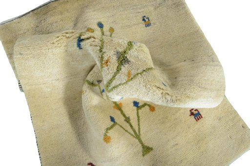 Corner detail of New Persian Gabbeh rug showing border pattern and Wool pile