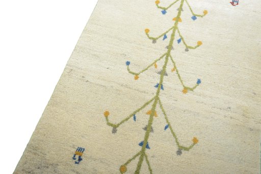 Backside of handmade New Persian Gabbeh rug showing knot structure and weave density