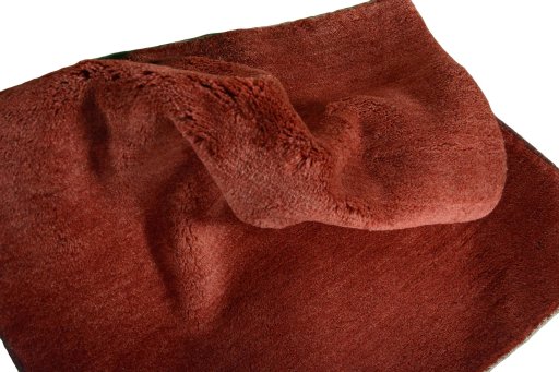 Corner detail of New Persian Gabbeh rug showing border pattern and Wool pile