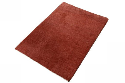 Corner detail of New Persian Gabbeh rug showing border pattern and Wool pile