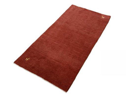 Corner detail of New Persian Gabbeh rug showing border pattern and Wool pile