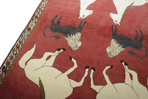 Backside of handmade 2000s Persian Gabbeh rug showing knot structure and weave density