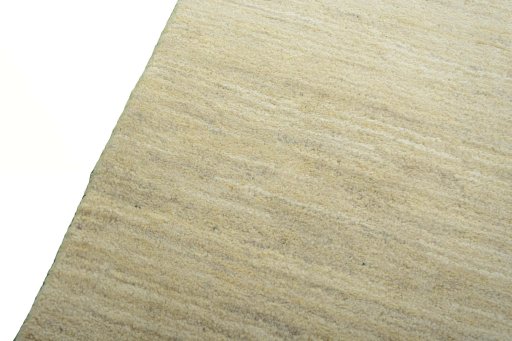 Backside of handmade New Persian Gabbeh rug showing knot structure and weave density