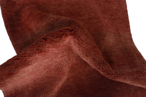 Corner detail of New Persian Gabbeh rug showing border pattern and Wool pile