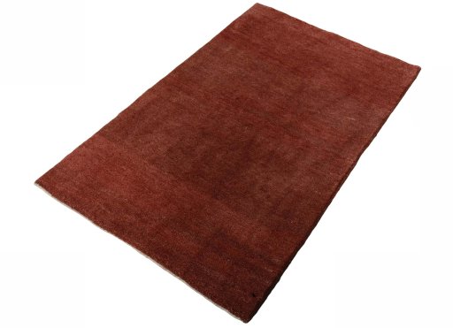 Corner detail of New Persian Gabbeh rug showing border pattern and Wool pile