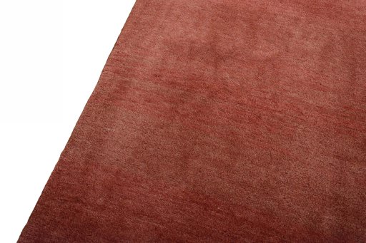Backside of handmade New Persian Gabbeh rug showing knot structure and weave density