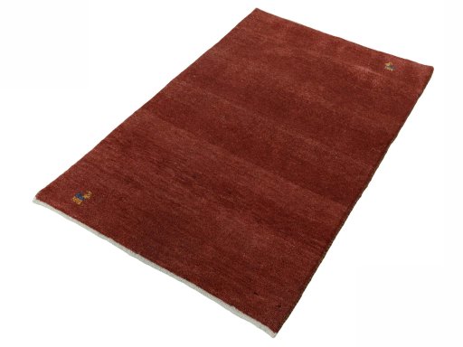 Corner detail of New Persian Gabbeh rug showing border pattern and Wool pile