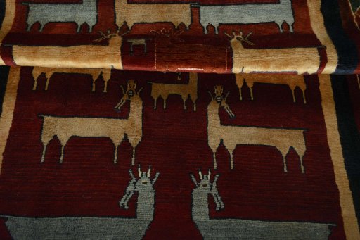 Full view of 2000s Persian Gabbeh rug from Iran / Persia, 208 × 126 cm in Red tones