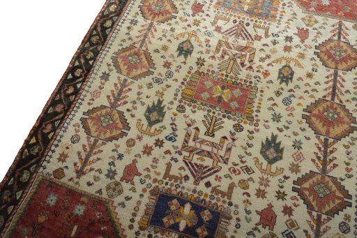 Backside of handmade 2000s Persian Gabbeh rug showing knot structure and weave density