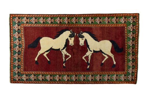 Full view of 2000s Persian Gabbeh rug from Iran / Persia, 245 × 135 cm in Red tones