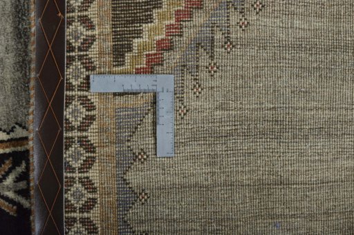 Surface texture of 2000s Persian Gabbeh rug with natural Wool and intricate pattern