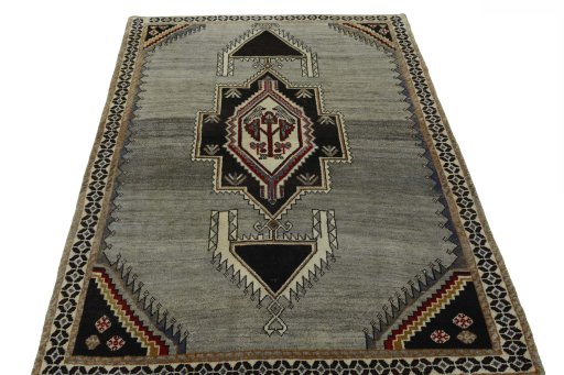 Surface texture of 2000s Persian Gabbeh rug with natural Wool and intricate pattern