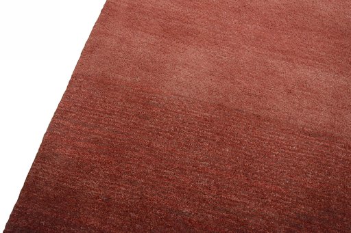 Backside of handmade New Persian Gabbeh rug showing knot structure and weave density