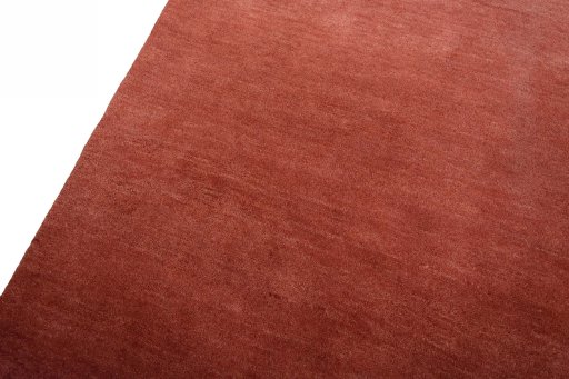 Backside of handmade New Persian Gabbeh rug showing knot structure and weave density