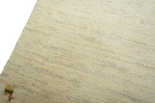 Backside of handmade New Persian Gabbeh rug showing knot structure and weave density