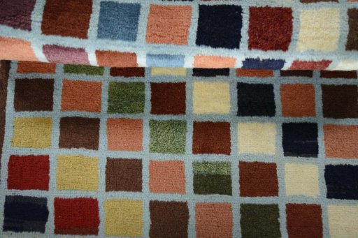 Full view of 2000s Persian Gabbeh rug from Iran / Persia, 122 × 64 cm in Multi Color tones