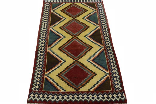 Surface texture of 2000s Persian Gabbeh rug with natural Wool and intricate pattern