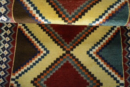 Full view of 2000s Persian Gabbeh rug from Iran / Persia, 146 × 78 cm in Multi Color tones