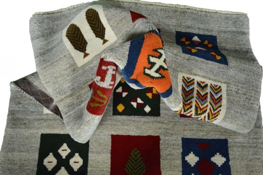 Corner detail of New Persian Gabbeh rug showing border pattern and Wool pile