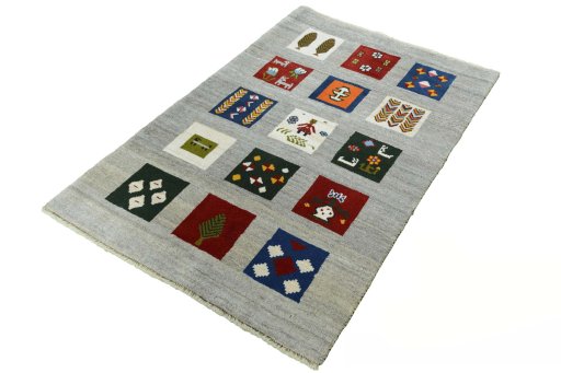 Corner detail of New Persian Gabbeh rug showing border pattern and Wool pile