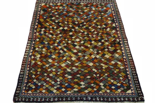 Surface texture of 2000s Persian Gabbeh rug with natural Wool and intricate pattern