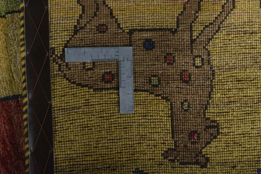 Close-up detail of 2000s Persian Gabbeh rug from Iran / Persia showing Wool weave