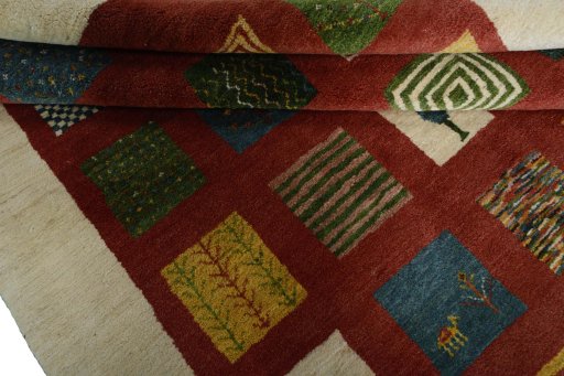 Full view of New Persian Gabbeh rug from Iran / Persia, 246 × 179 cm in Red tones