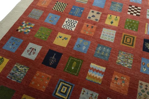 Backside of handmade New Persian Gabbeh rug showing knot structure and weave density
