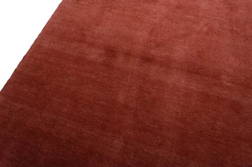 Backside of handmade New Persian Gabbeh rug showing knot structure and weave density