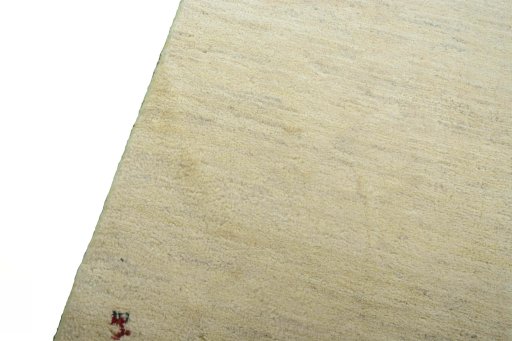 Backside of handmade New Persian Gabbeh rug showing knot structure and weave density