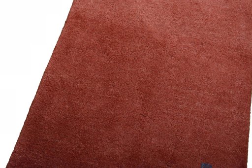 Backside of handmade New Persian Gabbeh rug showing knot structure and weave density