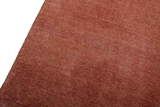 Backside of handmade New Persian Gabbeh rug showing knot structure and weave density