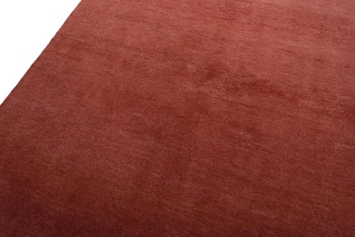 Backside of handmade New Persian Gabbeh rug showing knot structure and weave density