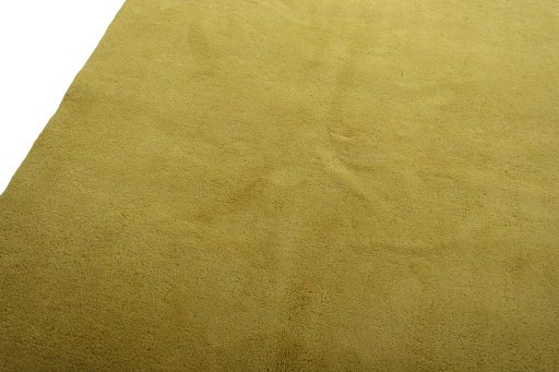 Backside of handmade New Persian Gabbeh rug showing knot structure and weave density